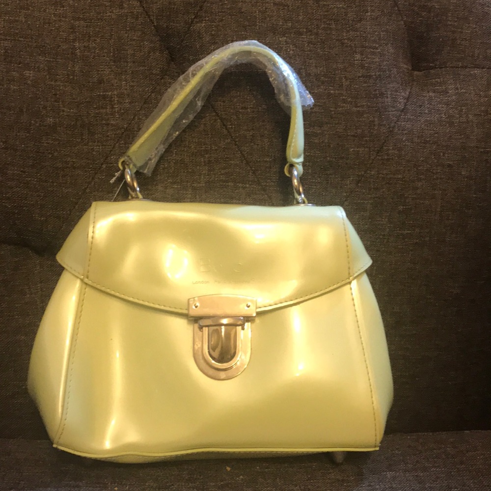 New with defects green Beijo bag.
